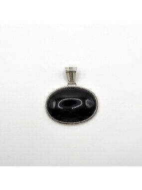 Loren Thomas Begay Sterling Silver Navajo Pendant With Oval Black Onyx Stone